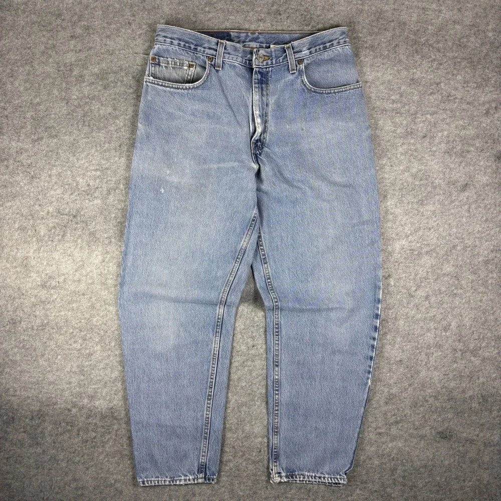 Vintage 90s Levis 560 Loose Fit Tapered Leg Light Wash Denim Jeans 33x30 USA
